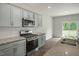 Modern kitchen with stainless steel appliances at 1230 Middlecrest Dr, Rocky Mount, NC 27804