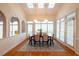 Breakfast nook with large windows and wood table at 1305 Enderbury Drive Dr, Raleigh, NC 27614