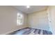 Bright bedroom with a window and hardwood floors at 1313 First Pointe, Sanford, NC 27332