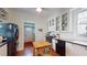 Well-equipped kitchen with black appliances and wood countertops at 132 Woodburn Rd, Raleigh, NC 27605