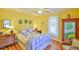 Charming bedroom with iron bed, and hardwood floors at 144G Celebrity Dairy Way, Siler City, NC 27344