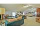 Large bonus room with sitting area and bed at 144G Celebrity Dairy Way, Siler City, NC 27344