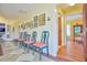Bright hallway with antique chairs and framed pictures at 144G Celebrity Dairy Way, Siler City, NC 27344
