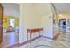 A hallway with a wooden console table and marble floors at 144G Celebrity Dairy Way, Siler City, NC 27344