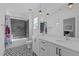 Bathroom with double vanity and gray tile at 1816 Center Ridge Dr, Apex, NC 27502