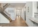 Bright and spacious entryway with hardwood floors and an elegant staircase at 182 Hillmont Dr, Garner, NC 27529