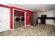 Laundry room with washer, dryer, and red walls at 2125 Eveton Ln, Sanford, NC 27330