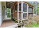 Wooden screened porch with deck, ideal for relaxing outdoors at 308 Deep Creek Dr, Clayton, NC 27520