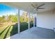 Covered patio with ceiling fan, overlooking grassy backyard at 344 Rocky Crest Ln, Wake Forest, NC 27587