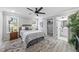 Main bedroom with ensuite bathroom and ceiling fan at 709 Chandler Rd, Durham, NC 27703