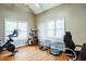 Home office featuring hardwood floors and large windows at 934 Lukestone Dr, Fuquay Varina, NC 27526