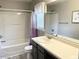 Bathroom with tub, shower, and single sink vanity at 112 Ryder Cup Cir, Raleigh, NC 27603