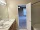 Bathroom with double sinks and access to bedroom at 112 Ryder Cup Cir, Raleigh, NC 27603