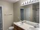 Bathroom with double sinks, a shower, and a bathtub at 112 Ryder Cup Cir, Raleigh, NC 27603