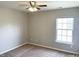 Bedroom with ceiling fan and window at 112 Ryder Cup Cir, Raleigh, NC 27603