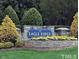 Eagle Ridge Golf Community entrance sign with landscaping at 112 Ryder Cup Cir, Raleigh, NC 27603