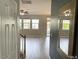 Bright entryway with mirror and view into living room at 112 Ryder Cup Cir, Raleigh, NC 27603