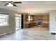 Kitchen with wooden cabinets, stainless steel appliances, and hardwood floors at 112 Ryder Cup Cir, Raleigh, NC 27603