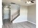 Living room with hardwood floors and staircase at 112 Ryder Cup Cir, Raleigh, NC 27603