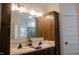 Elegant bathroom with double vanity, large mirror, and ample storage at 1120 Hillside Dr, Graham, NC 27253