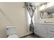 Bathroom boasts vanity, toilet and shower at 115 Kerr Dr, Roxboro, NC 27573
