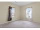Well-lit bedroom with two windows and neutral decor at 115 Kerr Dr, Roxboro, NC 27573