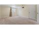 Spacious bedroom with neutral carpeting and ample closet space at 115 Kerr Dr, Roxboro, NC 27573