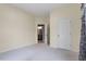 Bedroom with carpet and access to a private bathroom at 115 Kerr Dr, Roxboro, NC 27573