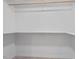 Walk-in closet with shelving and hanging rod at 115 Kerr Dr, Roxboro, NC 27573