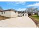 Spacious home with a large driveway and detached shed at 115 Kerr Dr, Roxboro, NC 27573