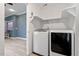 Convenient laundry room with washer and dryer hookups at 115 Kerr Dr, Roxboro, NC 27573