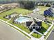 Aerial view of community pool, playground, and parking at 1301 White Verona Way, Knightdale, NC 27545