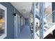 Clean and well-lit hallway with exterior access and fire escape at 1309 Hudson Ave # A7, Durham, NC 27705
