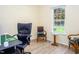 Home office featuring two armchairs and a large window at 1416 Chambers Rd, Rougemont, NC 27572