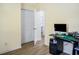 Bright home office with built-in desk and storage at 1416 Chambers Rd, Rougemont, NC 27572