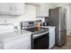 Modern kitchen with stainless steel appliances at 1416 Chambers Rd, Rougemont, NC 27572