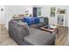 Living room with sectional sofa and coffee table at 1416 Chambers Rd, Rougemont, NC 27572