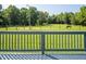 Horse in pasture with wood fencing and riding arena at 1416 Chambers Rd, Rougemont, NC 27572