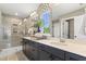 Modern bathroom with walk-in shower, double vanity, and large mirror at 223 Augusta Pond Way # 158, Raleigh, NC 27603
