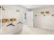 Large walk-in closet with custom shelving and hanging rods at 223 Augusta Pond Way # 158, Raleigh, NC 27603