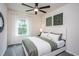 Serene bedroom with green bedding and natural light at 773 Denburn Pl, Raleigh, NC 27603