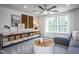 Bright bonus room with comfortable seating and a ceiling fan at 773 Denburn Pl, Raleigh, NC 27603