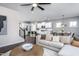 Living room with sectional sofa, coffee table, and fireplace at 773 Denburn Pl, Raleigh, NC 27603