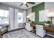 Home office with two desks and large windows at 773 Denburn Pl, Raleigh, NC 27603