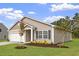 New single-story home with neutral siding, a two-car garage, and well-manicured lawn at 101 Shelfit Trl, Oxford, NC 27565