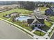 Aerial view of community pool, playground, and parking at 1324 White Verona Way, Knightdale, NC 27545