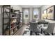 Home office with built-in shelving and wood desk at 1324 White Verona Way, Knightdale, NC 27545