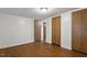 Bedroom with hardwood floors and double closets at 1705 Old Nc 10 Hwy, Hillsborough, NC 27278