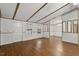 Living room with hardwood floors and a view to the dining area at 1705 Old Nc 10 Hwy, Hillsborough, NC 27278