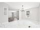 Dining room with marble flooring and chandelier at 174 Pine Needles Dr, Lillington, NC 27546